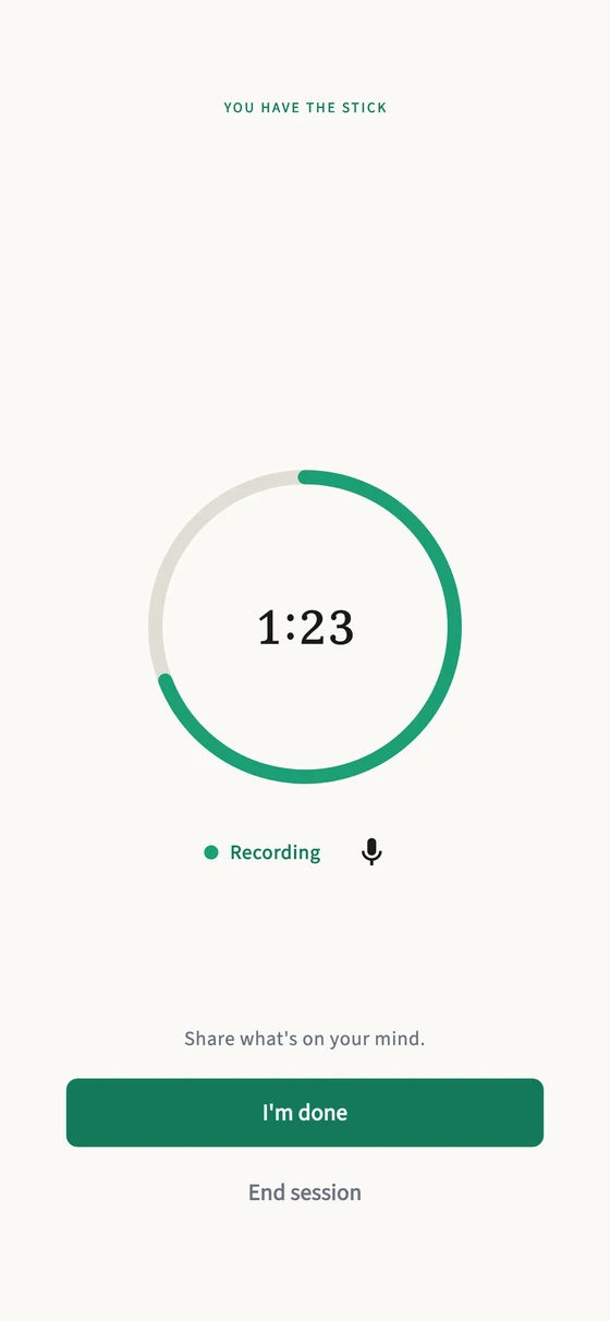 TalkStik session screen: "You have the stick", mid-turn at 1:23 with the timer ring recording